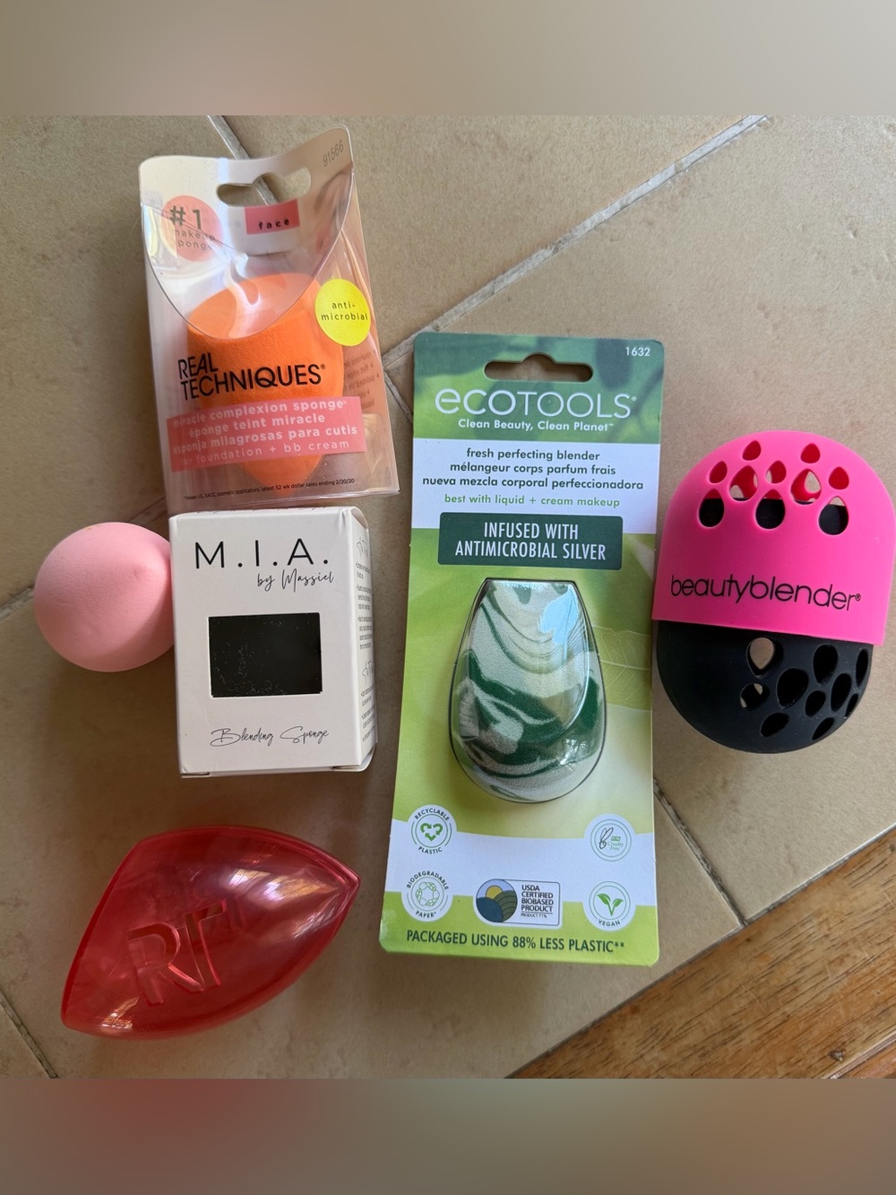 Various makeup sponges and holders